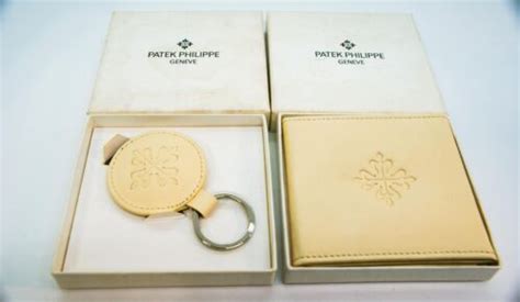 SIGNED PATEK PHILIPPE, GENEVE, THE KEY CHAIN NO.